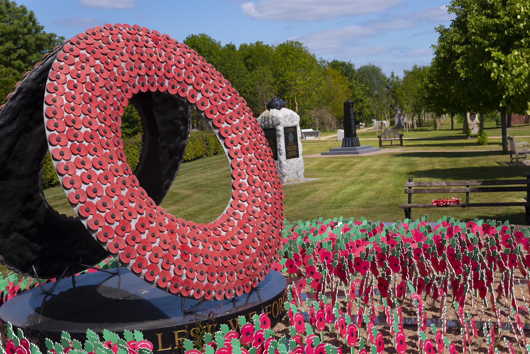 Royal British Legion Poppy Memorial. Giant Poppy Wreath and Lots of Individual Poppy Tributes