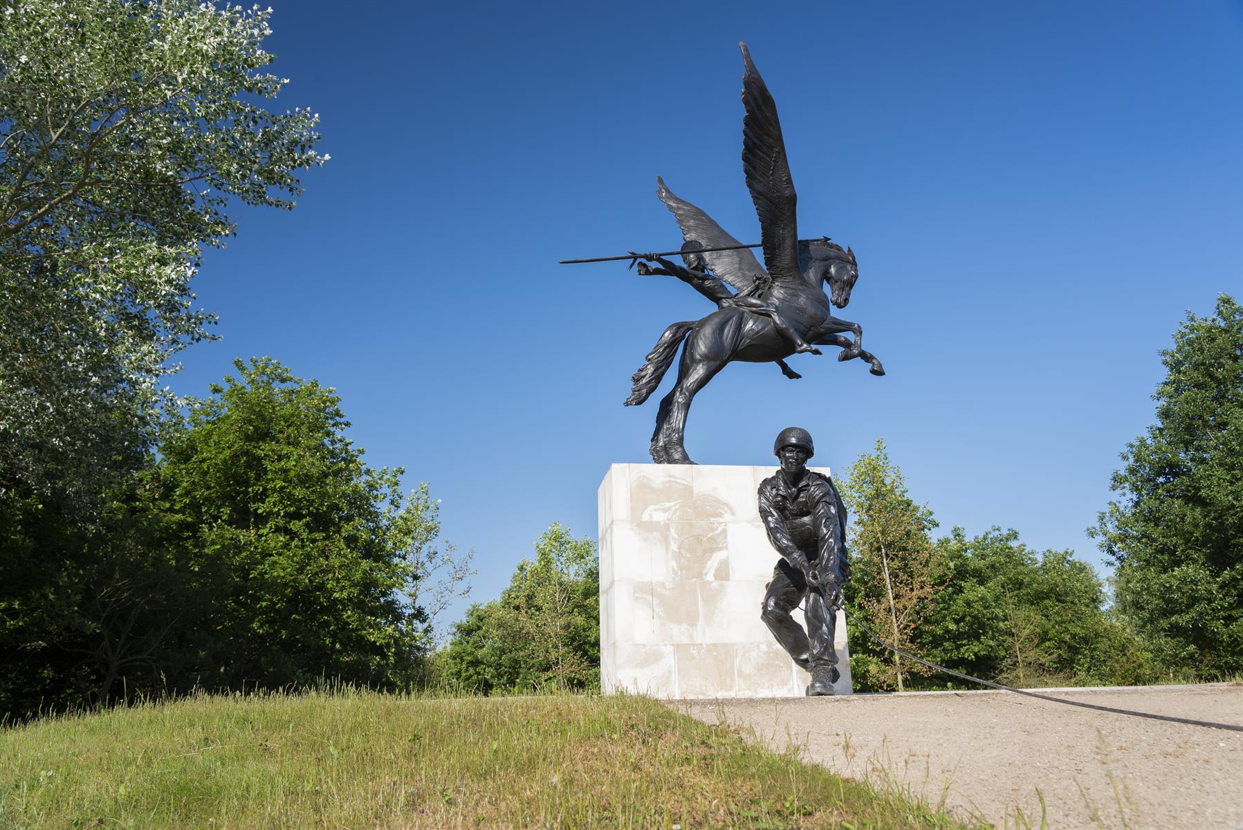 Parachute Regiment Memorial. Bronze Statue of Pegasus and Bellerophon with soldier and Bergen