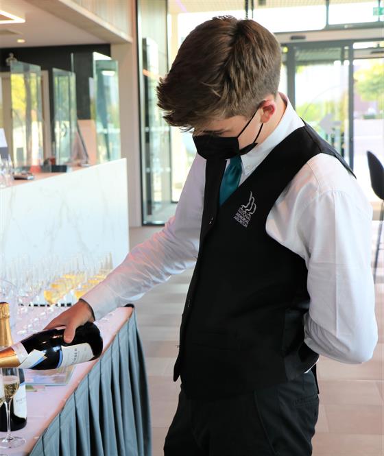 Aspects Event Staff pouring sparkling wine